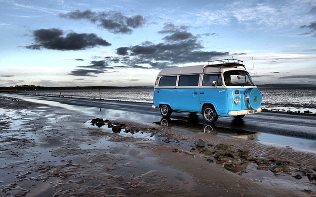 image that shows a van with a low rear wheel arch that has undergone campervan conversions